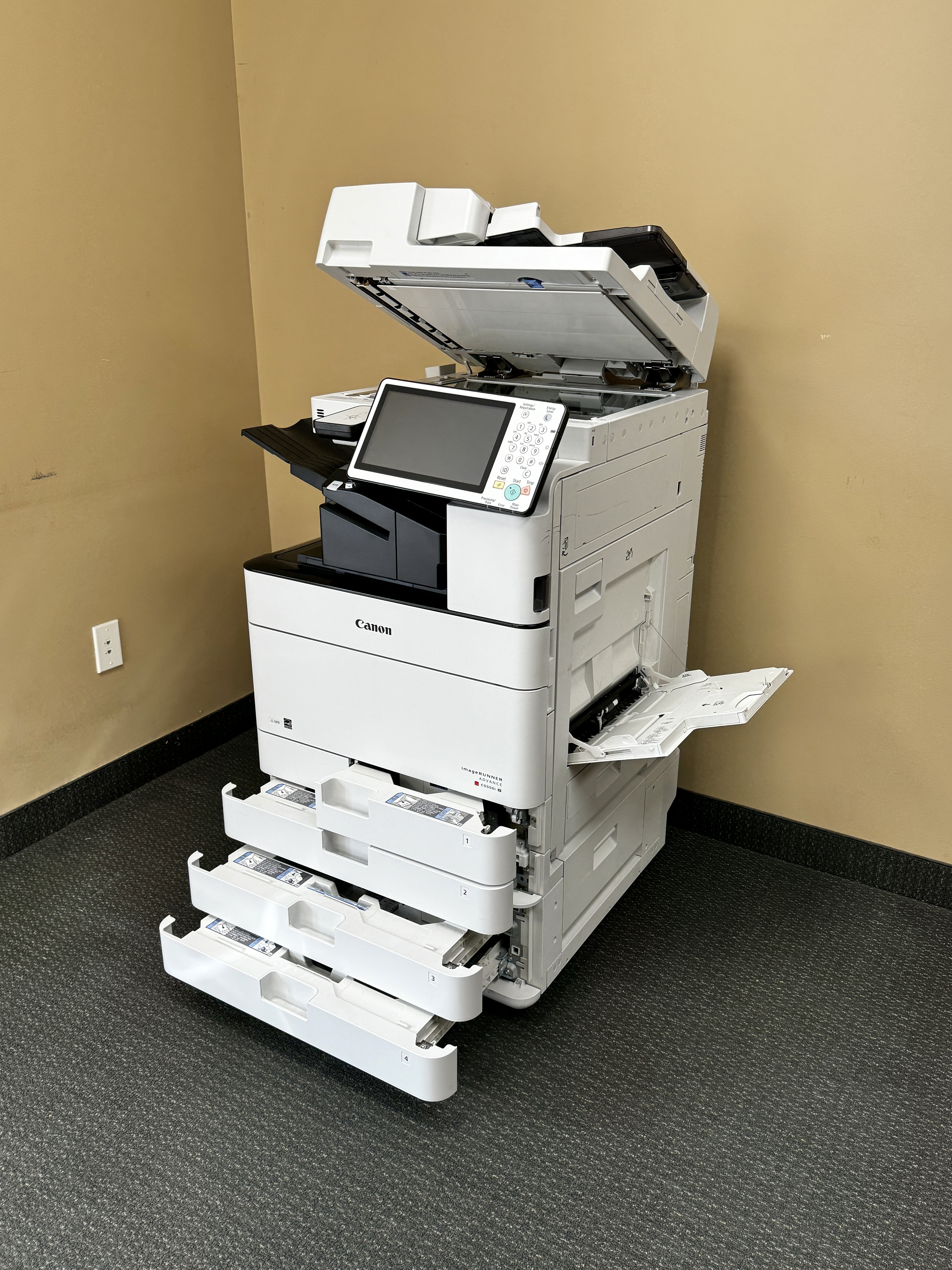 paper trays open on a canon advance imagerunner 4525i