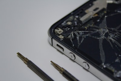 IPhone 4 shattered cell phone screen. 